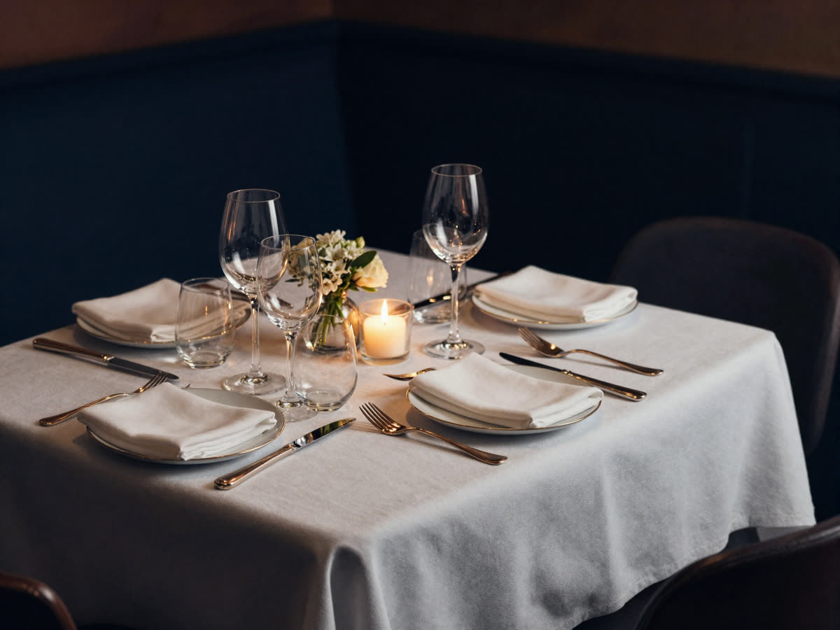 Elegant dining room prepared for evening service
